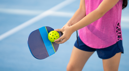 girl serving ball