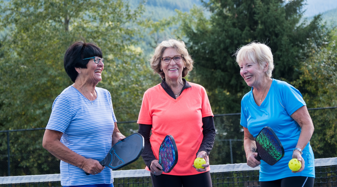 Women playing pickleball