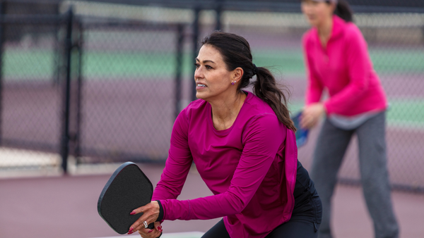 Woman playing pickleball